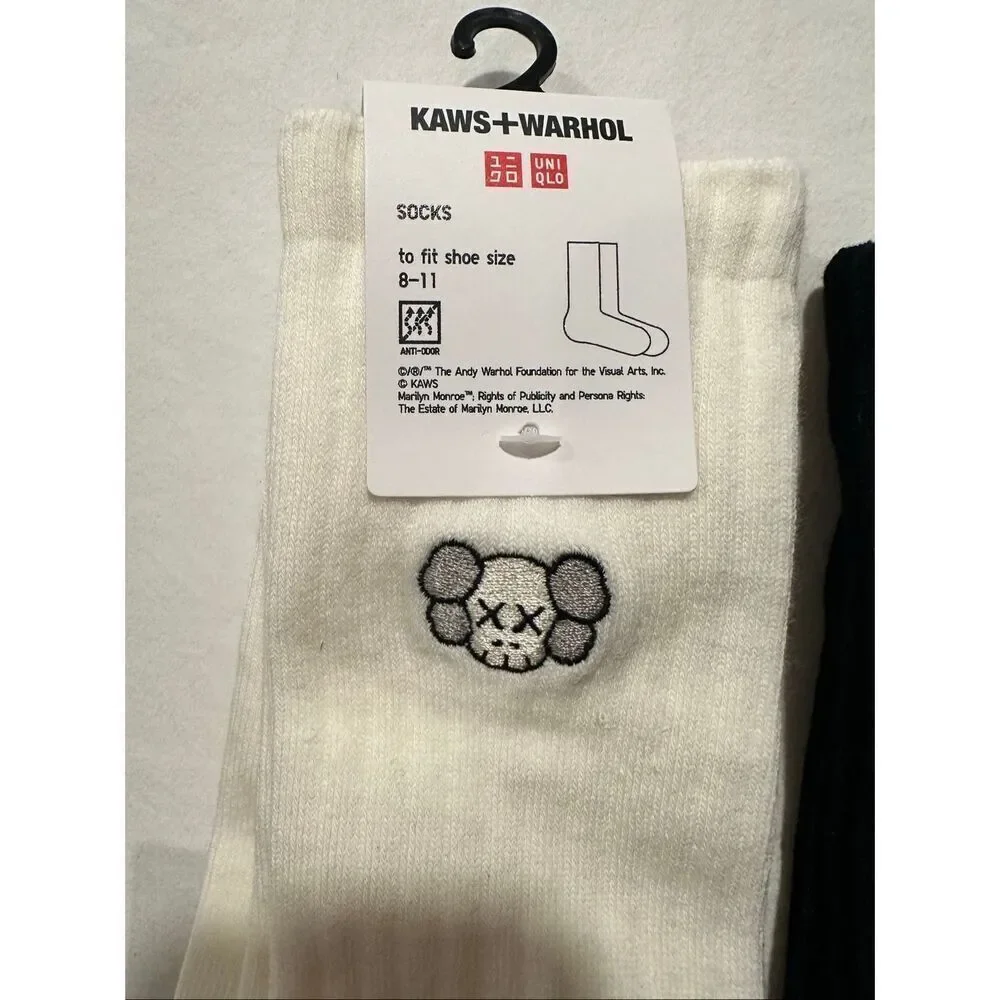 Mismatched Uniqlo x Artist Socks – KAWS Elmo & Andy Warhol Lips